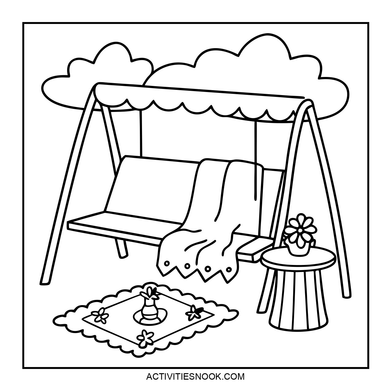 A cozy swing bench with a blanket and a side table.
