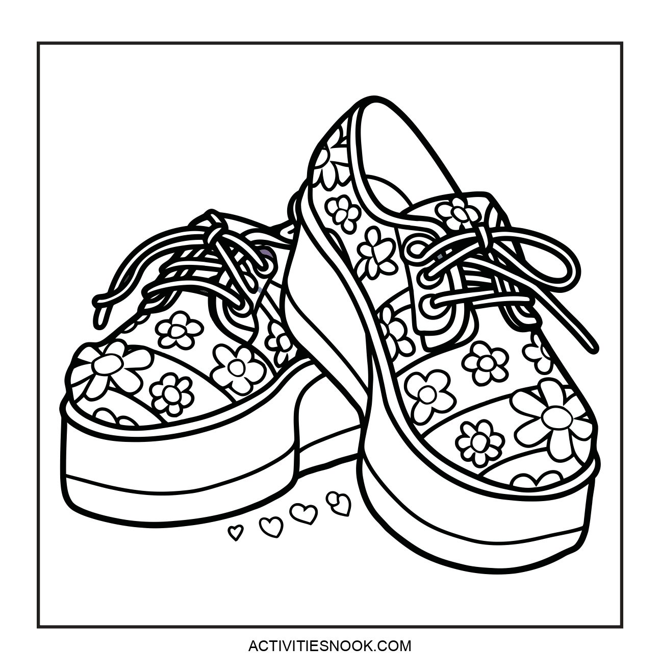 Black and white illustration of platform shoes decorated with floral patterns and laces.