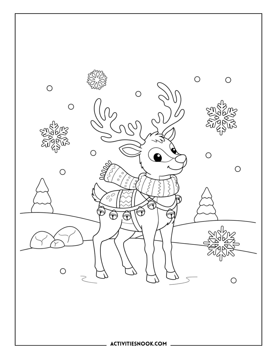Reindeer wearing cozy winter clothes and bells standing in a snowy field.