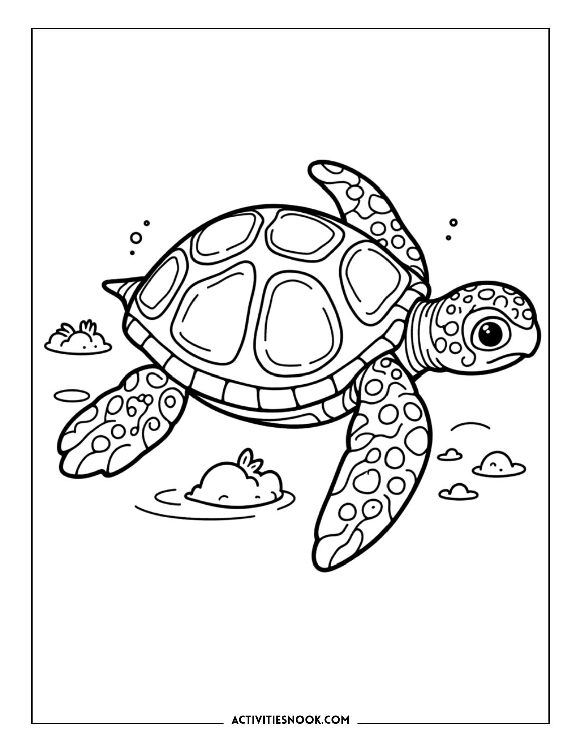 Realistic sea turtle gliding over sandy ocean floor with rocks and bubbles coloring page.