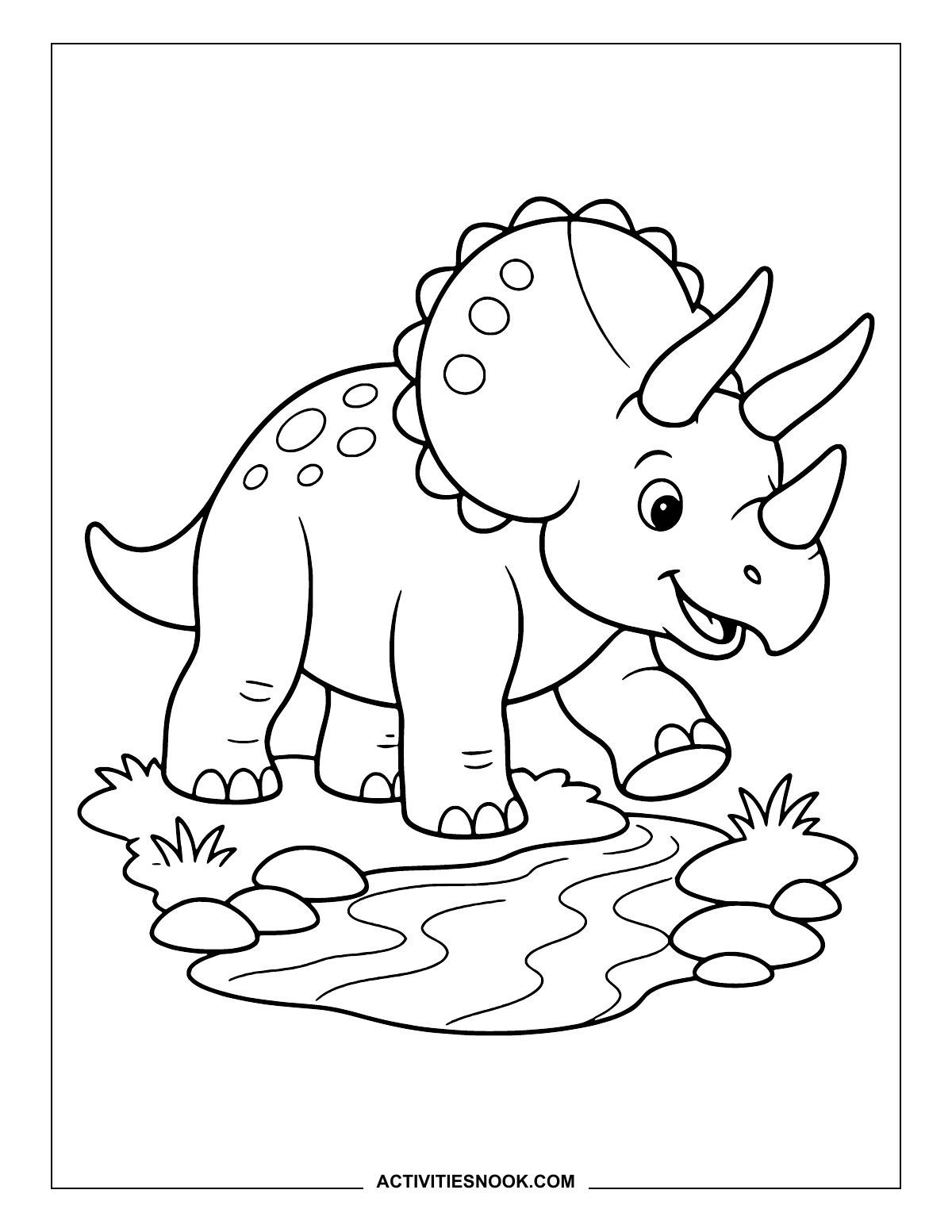 Triceratops stepping across a stream between rocks and grass.